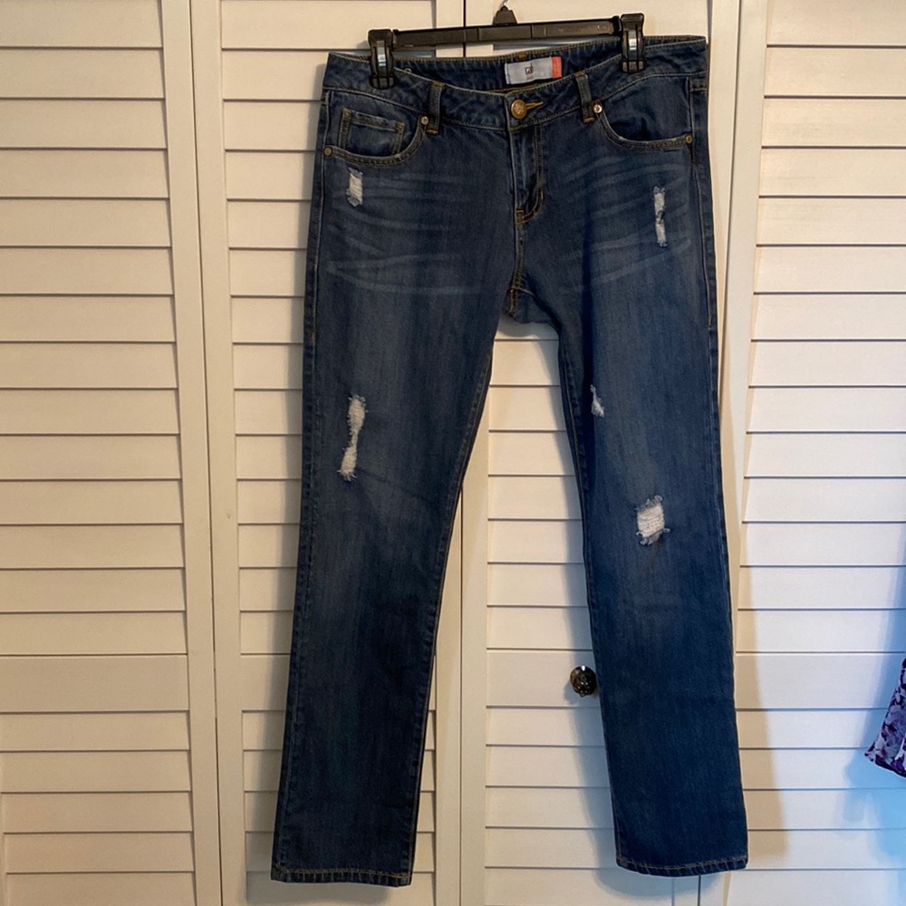 Cabi size 8 distressed jeans stretch.  Slim straight, Great fit high waisted.